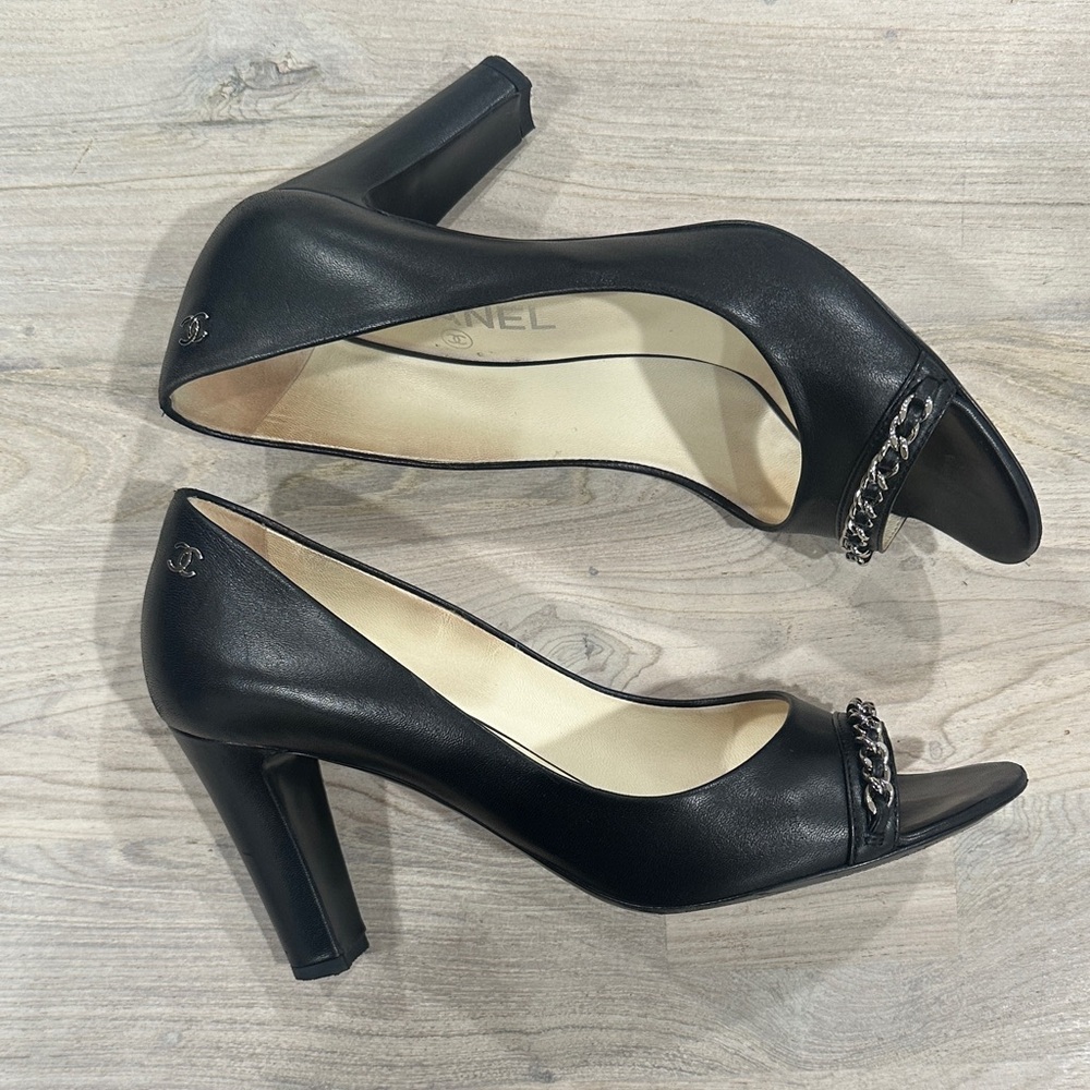 CHANEL Black Leather Heels with Chain Accent